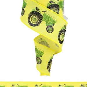 May include: Yellow ribbon with a green tractor print. The tractor is repeated on the ribbon.