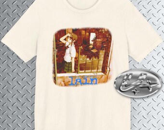 May include: A white t-shirt with a graphic print of a young woman standing in a window. The graphic is in a vintage style with a faded, brown color scheme. The text "lain" is printed in blue below the graphic.