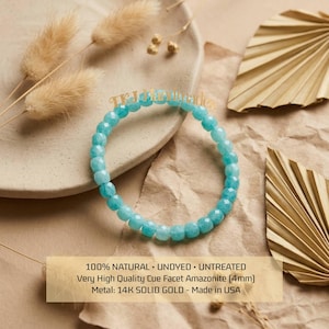 May include: A light blue Amazonite bracelet with 4mm faceted beads. The bracelet is made with 14K solid gold metal. The image also includes text that reads "100% NATURAL • UNDYED • UNTREATED" and "Made in USA".