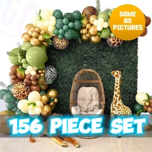 May include: A 156 piece balloon arch kit in green, brown, gold, and white with animal print balloons. The arch is decorated with a stuffed giraffe and a wicker chair. The text "SAME AS PICTURES" is visible in the top right corner of the image.