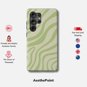 K&ouml;nnte beinhalten: Eine Handyh&uuml;lle mit einem gr&uuml;nen und beigefarbenen Wellenmuster. Die H&uuml;lle hat ein Kameramodul oben links. Der Text "AesthePoint" befindet sich unten. Das Bild enth&auml;lt auch Symbole f&uuml;r Kundenservice und Versand.