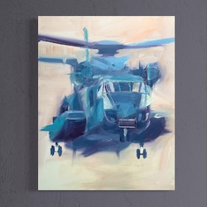 May include: An abstract painting of a blue helicopter against a light beige background. The artwork features broad brushstrokes and a focus on the vehicle's form, with visible rotors and landing gear. The colour palette is dominated by shades of blue.