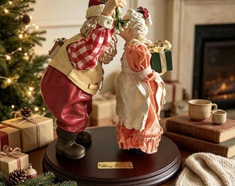 Vintage Kurt Adler Fabriche Santa & Mrs Claus Figurine, Merry Kiss-mas Christmas Tablepiece on Wood Stand 9.5", Holiday Mistletoe Kiss Decor