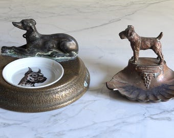 ¿Prefieres bronce patinado vintage? Ceniceros con forma de perro: ¿bandeja redonda con inserto de cerámica de 6,75" de diámetro o con forma de concha de 5" x 3,5" x 3,5" de Alemania?