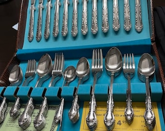 Continental Stainless Japan Floral Flower Scroll Handle Flatware 74 piece with case
