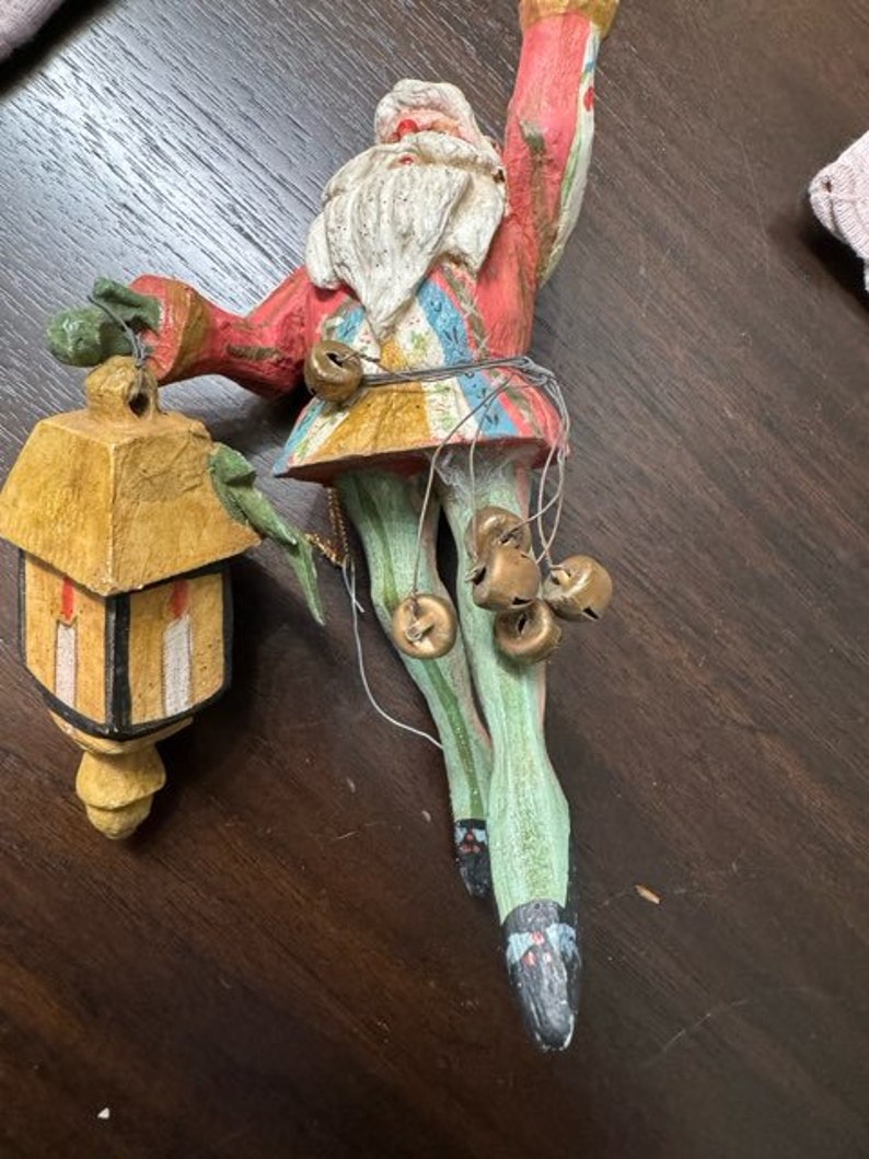 HOUSE OF HATTEN 1988 Christmas Ornament Flying Santa With Yellow Candle