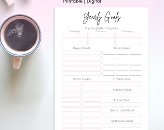 May include: Printable yearly goals planner with sections for major goals, minor goals, milestones, fitness, career, travel, social life, self-care, and hobbies. The planner has a pink and white color scheme.