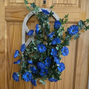 May include: A set of three ceramic mugs with a speckled, matte finish. The mugs are in shades of cream, light gray, and dark gray. Each mug has a simple, minimalist design, perfect for coffee or tea.