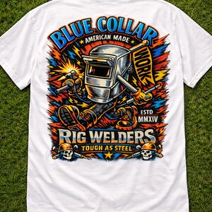 May include: White t-shirt with a colorful graphic featuring a welding helmet and the words "Blue Collar American Made" and "Rig Welders Tough as Steel." The design includes a worker with welding tools.