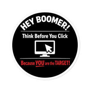 May include: A round sticker with a black background and white border. The text "HEY BOOMER!" is at the top, with "Think Before You Click" below. A computer monitor icon with a cursor is in the center, and "Because YOU are the TARGET!" is at the bottom.