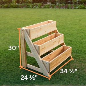 May include: A three-tiered wooden planter with a natural finish. The planter is 30 inches tall, 24.5 inches wide, and 34.5 inches long. It is designed for outdoor use and is set on a green lawn.