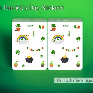 May include: Two sheets of St. Patrick's Day stickers with various festive illustrations. The stickers feature rainbows, shamrocks, leprechaun hats, pots of gold, and cupcakes. The text "St Patrick's Day Stickers" is at the top.
