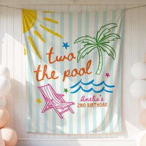 May include: A beach-themed banner with the words "two the pool" in orange script, a pink beach chair, and a palm tree. The banner is decorated with a sun, stars, and waves. The text "Amelia's 2ND BIRTHDAY" is also on the banner. Balloons in white and peach colors are on the left and right.