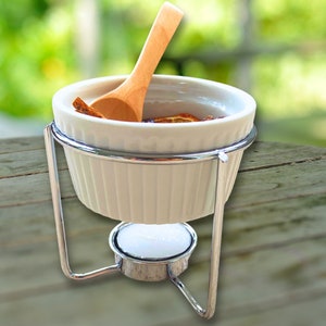 small potpourri simmering soup heating pot
