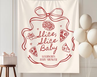 May include: A cream-colored baby shower backdrop with a red pizza-themed design. The text "Slice, Slice Baby" is featured, along with pizza slices and cherries. The backdrop is decorated with a bow, hearts, and the text "Madison's Baby Shower". White balloons and a gift box are also present.