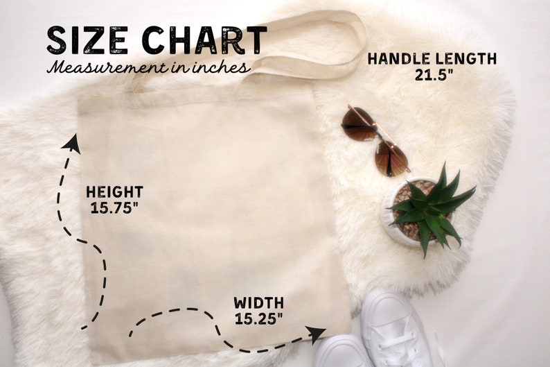 May include: A beige canvas tote bag with black stitching and a size chart in inches. The bag is 15.75 inches tall, 15.25 inches wide, and has a handle length of 21.5 inches.