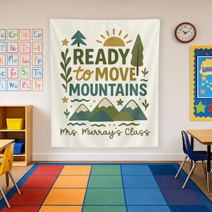 May include: A white classroom banner with green mountains, a yellow sun, and the text "Ready to Move Mountains" and "Mrs. Murray's Class".