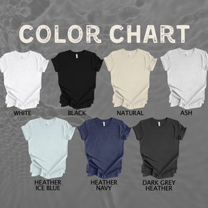 Pode incluir: Carta de cores mostrando diferentes cores de camisetas, incluindo branco, preto, natural, cinza, azul gelo mesclado, azul marinho mesclado e cinza escuro mesclado.