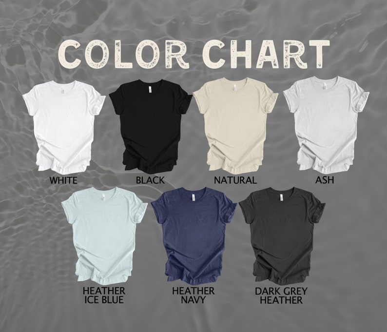 Pode incluir: Carta de cores mostrando diferentes cores de camisetas, incluindo branco, preto, natural, cinza, azul gelo mesclado, azul marinho mesclado e cinza escuro mesclado.