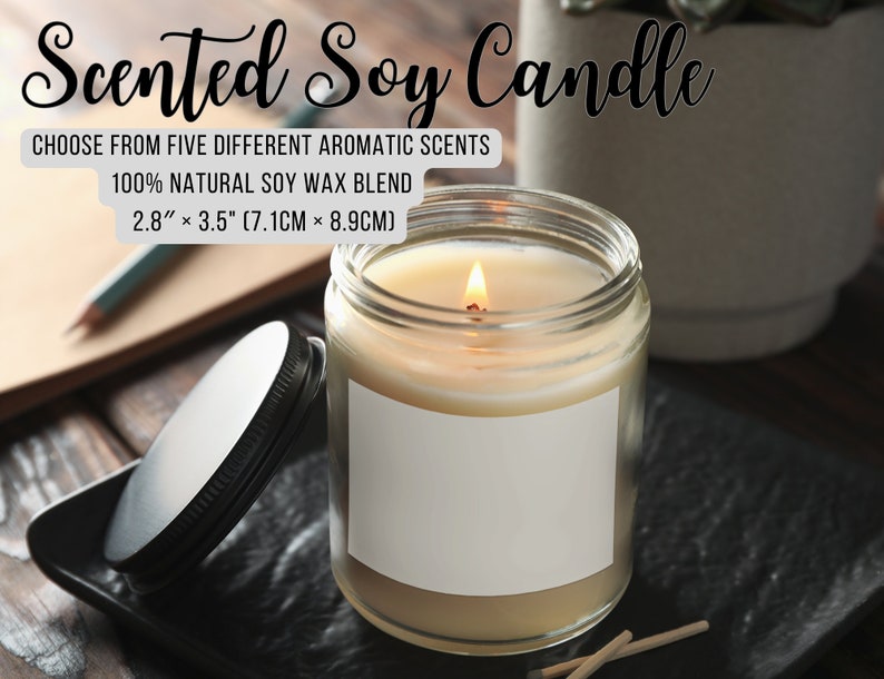 May include: A clear glass jar candle with a white label. The candle is lit and the flame is visible. The candle is on a wooden surface with a black lid and matches. The text on the label reads "Scented Soy Candle" and "CHOOSE FROM FIVE DIFFERENT AROMATIC SCENTS 100% NATURAL SOY WAX BLEND 2.8" x 3.5" (7.1CM &times; 8.9CM)"