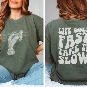 Life goes fast take it slow manatee comfort colors tshirt cute funny manatee shirt gift for sea cow chubby mermaid lovers florida gifts
