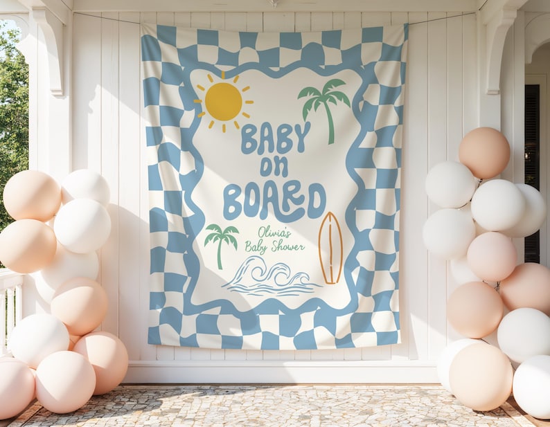 May include: A baby shower backdrop with a blue and white checkered pattern and the words "Baby on Board." The design includes a yellow sun, palm trees, a surfboard, and waves. Balloons in shades of white and peach are on either side.