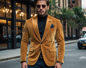 May include: A man wearing a mustard yellow velvet blazer with a black turtleneck shirt and dark blue pants. He is wearing sunglasses and has a beard.