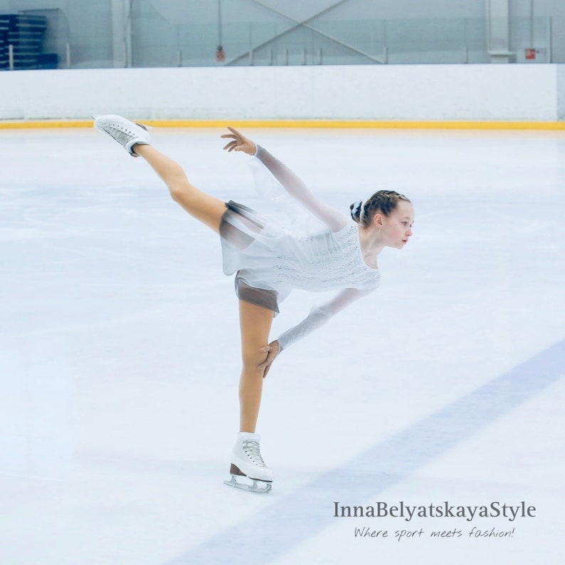 Girl in the "Overture" dress on ice