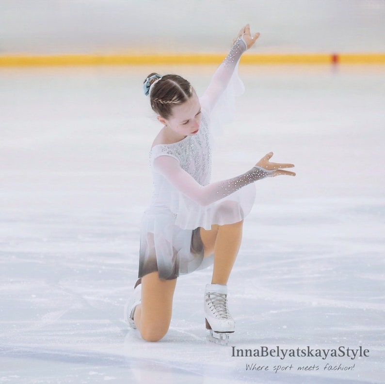 Girl in the "Overture" dress on ice