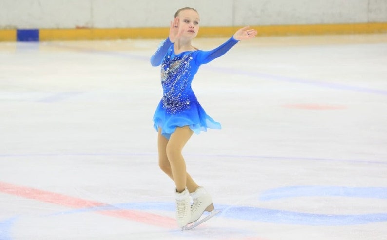 Girl in "Sonata" dress on ice!