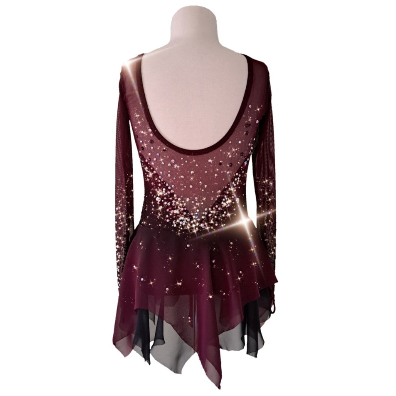 A new figure skating dress "Carmine" for performances and competitions. The dress is made in the ombre technique and hand-painted with an airbrush from carmine red to deep mahogany! Back view