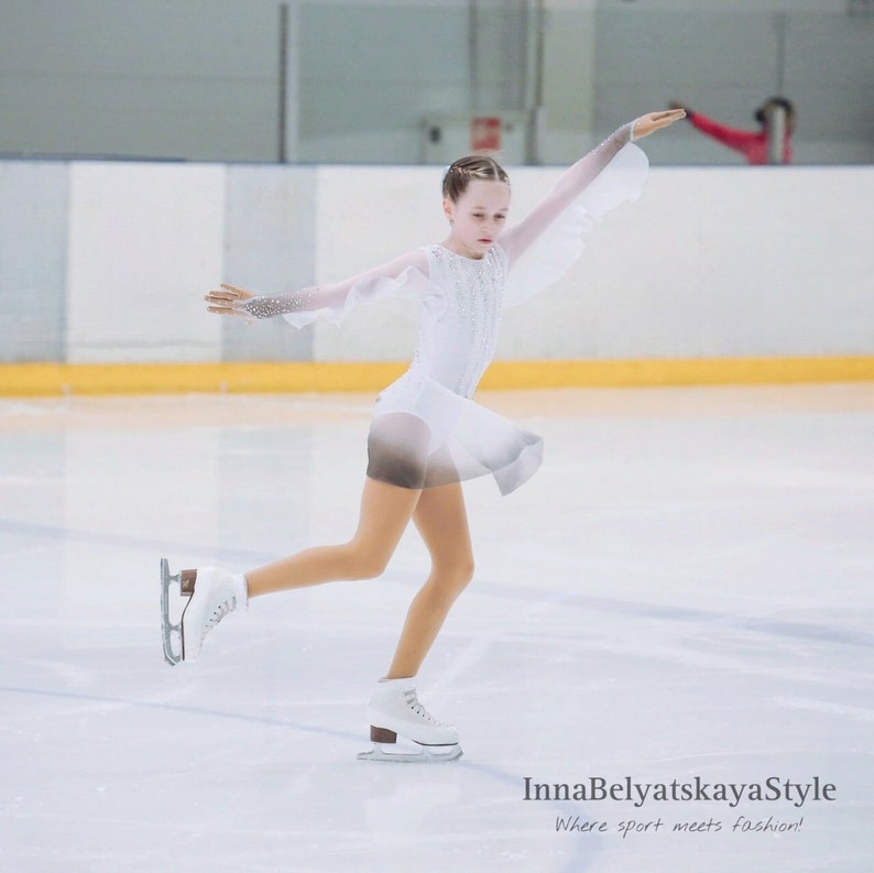Girl in the "Overture" dress on ice