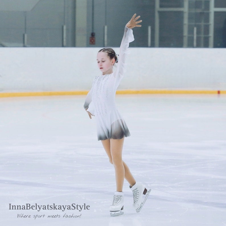 Girl in the "Overture" dress on ice