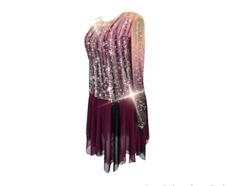 May include: A figure skating dress with a long-sleeved, sequined bodice in shades of pink, purple, and black. The skirt is a layered tulle in burgundy and black.
