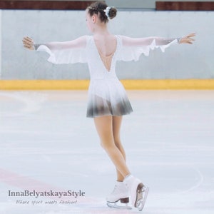 Girl in the "Overture" dress on ice