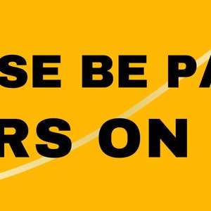 May include: A yellow sign with a gold swirl design and the text "PLEASE BE PATIENT SENIORS ON BOARD" in black.