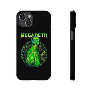 May include: Black iPhone case with a green and black graphic of a skeleton wearing a VR headset and holding a green orb. The text "Megadeth" is printed in white above the graphic.