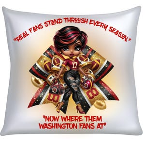 May include: Square decorative pillow featuring a cartoon illustration of a woman in a football uniform. The design includes a large bow with footballs and the text "REAL FANS STAND THROUGH EVERY SEASON." and "NOW WHERE THEM WASHINGTON FANS AT".