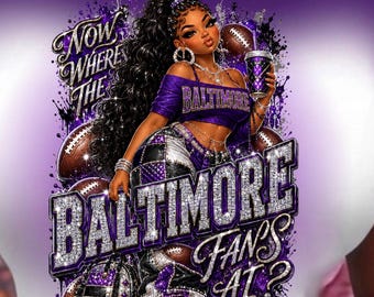 May include: A purple and white t-shirt featuring a graphic illustration of a person with long dark hair, wearing a purple crop top and pants, holding a football and a cup. The text reads Now Where The Baltimore Fans At? with glitter accents.