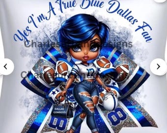 May include: A white cushion featuring a cartoon illustration of a woman in a Dallas Cowboys football uniform. The text "Yes I'm A True Blue Dallas Fan" is written in blue script. The woman is holding a football and a purse that says "Dallas Cowboys".
