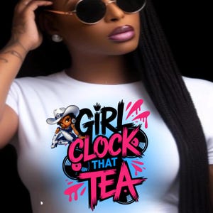 May include: White t-shirt with a graphic design featuring the text "GIRL CLOCK THAT TEA" in pink and black. The design includes a cartoon figure wearing a cowboy hat and a light blue background.