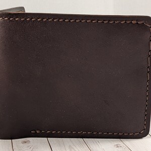 Cartera de cuero plegable cosida a mano