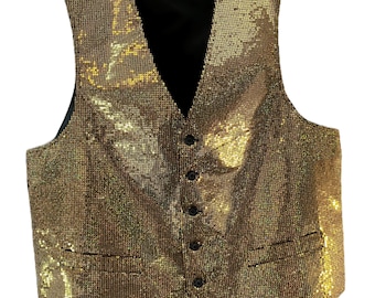 May include: Gold sequin vest with a black satin back and trim. The vest has a V-neck, four black buttons, and two front pockets. The label reads "Vintage Club".