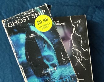 Used VHS movie tape and DVD set of ghost ship & ghost stories
