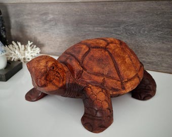 Wooden sculpture of an animal, a turtle, a water turtle, a unique wooden figure, handcrafted from Suar wood and carved.
