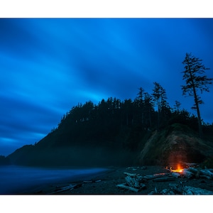 Photograph of Campfire on Indian Beach at Night with Dramatic Clouds over Indian Point, Ecola State Park, Oregon Coast, Pacific Northwest