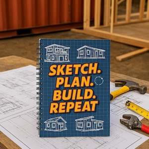 May include: A blue spiral bound notebook with the text "Sketch. Plan. Build. Repeat." in orange letters. The notebook has a grid pattern and illustrations of houses on the cover.