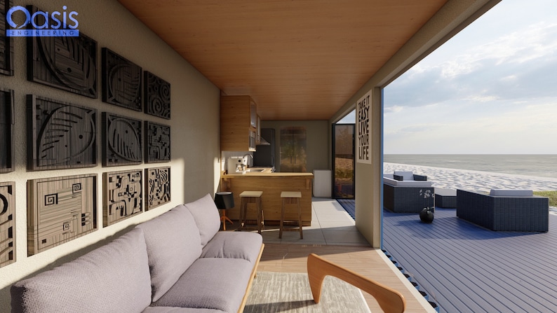Render of a pre-engineered shipping container home (C1), showcasing a sustainable, modern, and minimalist design, perfect for a tiny modular metal home. A living room interior with a gray couch, a wooden coffee table, and a kitchen with a wooden countertop and bar stools. The room has a large window that opens to a view of a beach with blue water and a sandy shore. The window has a sign that reads 'Take it easy, live your life'.
