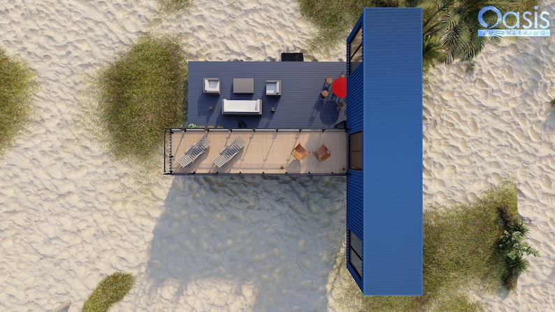 Render of a pre-engineered shipping container home (C1), showcasing a sustainable, modern, and minimalist design, perfect for a tiny modular metal home. A blue container home with a wooden deck and a railing. The deck has a lounge chair, a table with a red umbrella, and two chairs. The container home is on a sandy beach with green grass and trees.