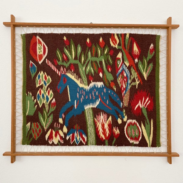 A Swedish Flemish tapestry with Unicorn and flowers. Scandinavian mid century modern design.